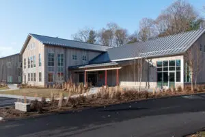 A large gray barn style building